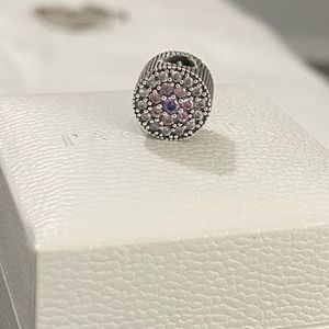 100% Authentic Pandora Dazzling floral charm.